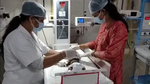 Infant Placed Living in India Struggles for Her Life