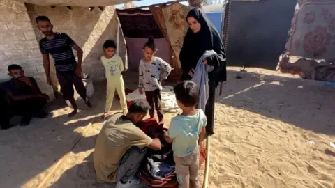 Escaping One Hellscape to the Next: Gazans Describe Dire Conditions in Israeli-Declared Humanitarian Zone